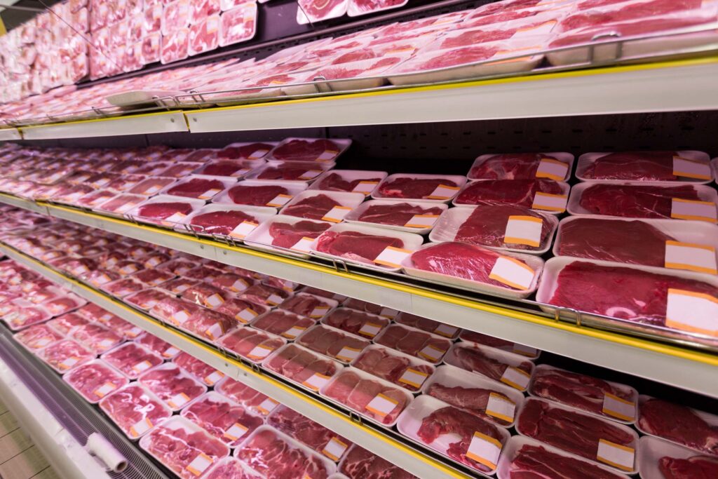 supermarket isle full of packaged meat